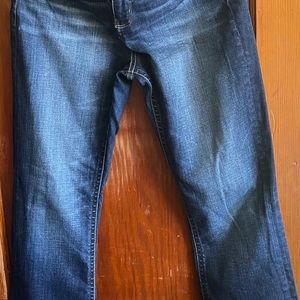 Ladies Buckle Black jeans size 31 length 34 bootcut sits mid to high on waist